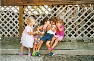 Giggling Over a Cousin's Kiss by Charles Van Deursen