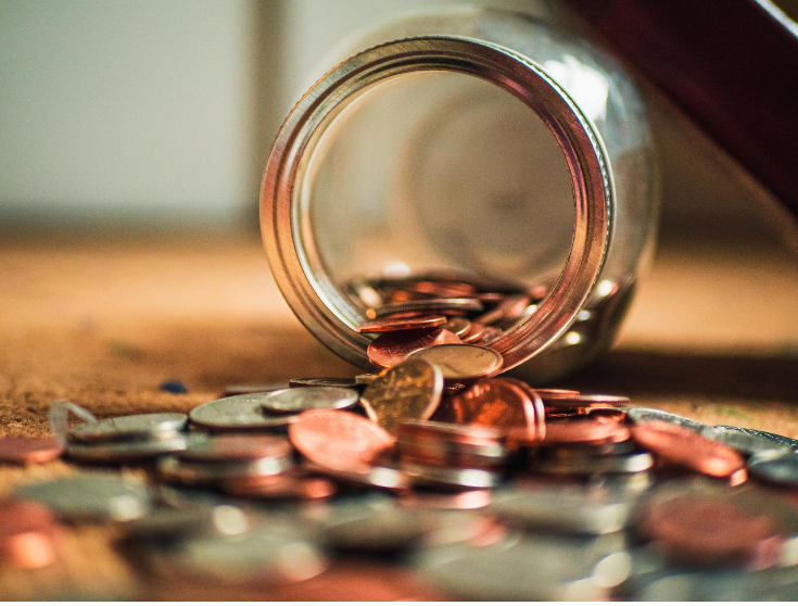 Spilled Coins Photo by Josh Appel on Unsplash