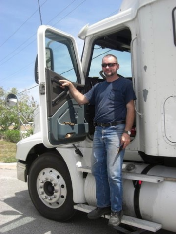 Charles Van Deursen and one of the semi tractor-trailers that he drove. www.InTuneWithYou.com Charles Van Deursen and one of the semi tractor-trailers that he drove. www.InTuneWithYou.com